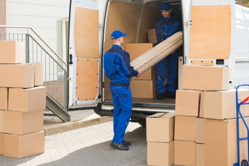 Removal van and moving team serving Holland Park homes