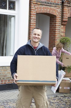 Packing materials and neatly labelled moving boxes for a home in Holland Park
