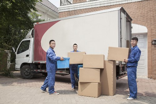 Man and van moving service in Holland Park with local residential street setting
