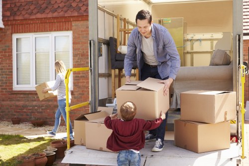Packing and loading items into a removals van in West London