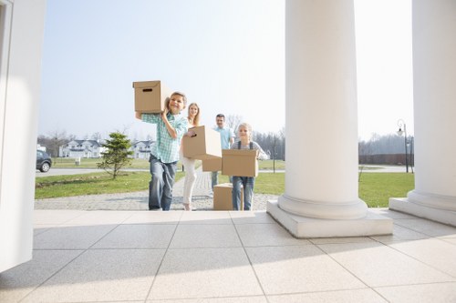 Team preparing a van load safely before a move