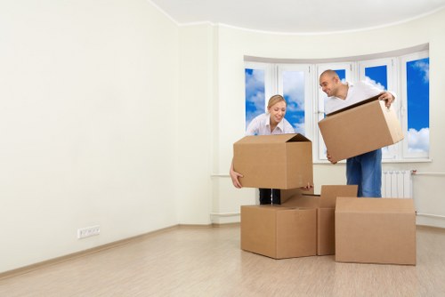 Business relocation team loading office items for a Holland Park move
