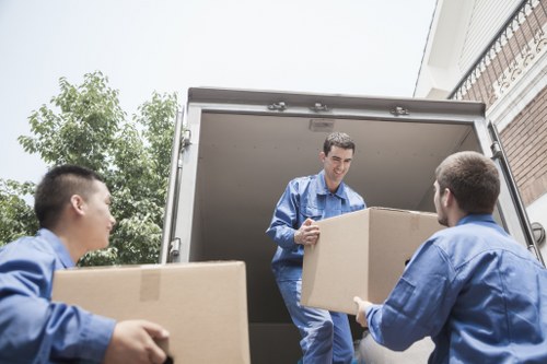 Local moving van serving flats and homes in Holland Park