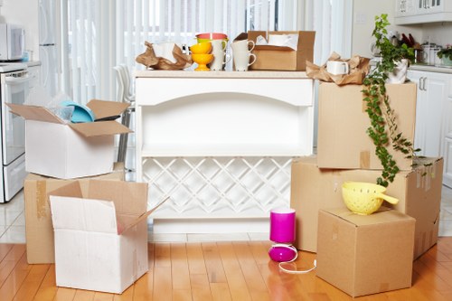 Prepared moving boxes and furniture for truck hire in Holland Park