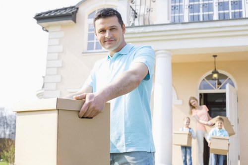 Careful packing and wrapping of furniture for a Holland Park house move
