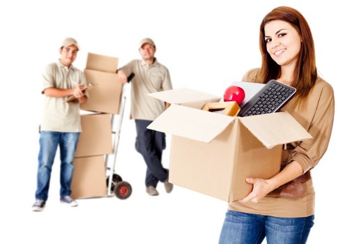 Local moving truck and packed boxes for a Holland Park relocation