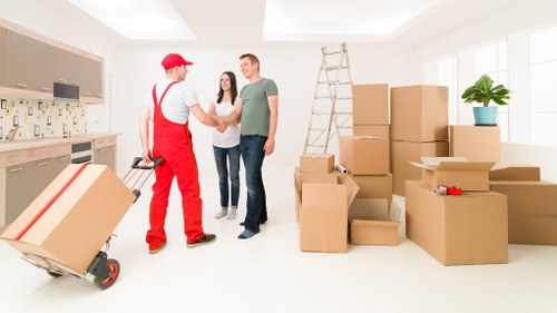 Local van service handling boxes and household items in Holland Park