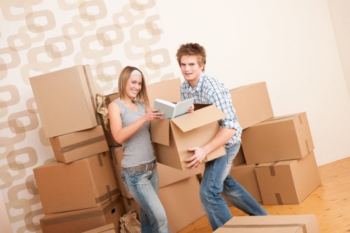 Careful packing and loading during a house move in West London