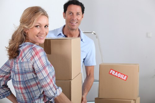 Home moving checklist and packed boxes ready for a move in Holland Park