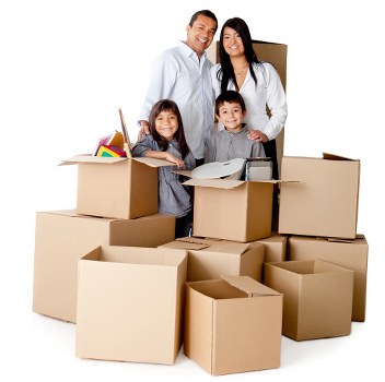 Professional movers handling furniture for a Holland Park home